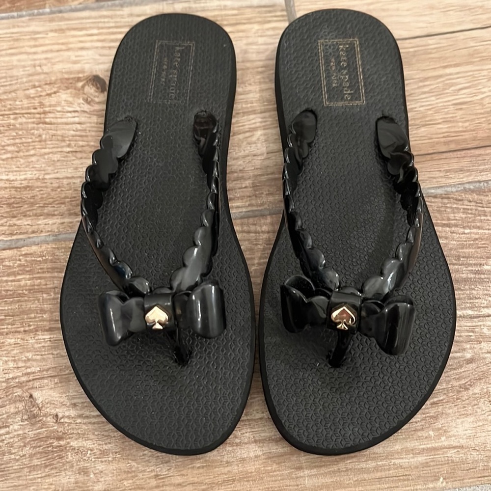 New Kate spade black flip flops size 7-8